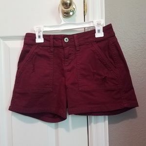 Maroon ripped shorts